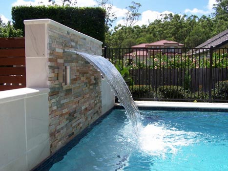 stacked stone pool waterfall