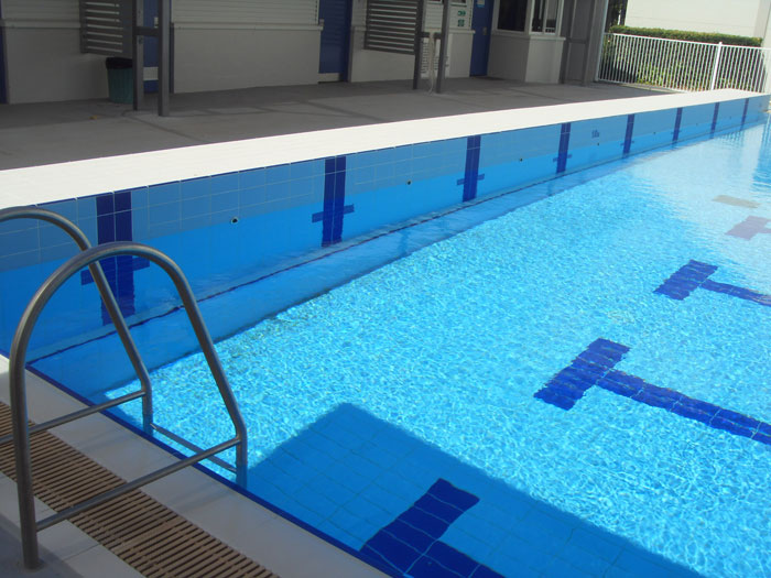 Serapool drain grate and finger grip pool deck tiles