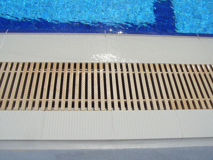 Serapool grate and finger grip pool deck tiles