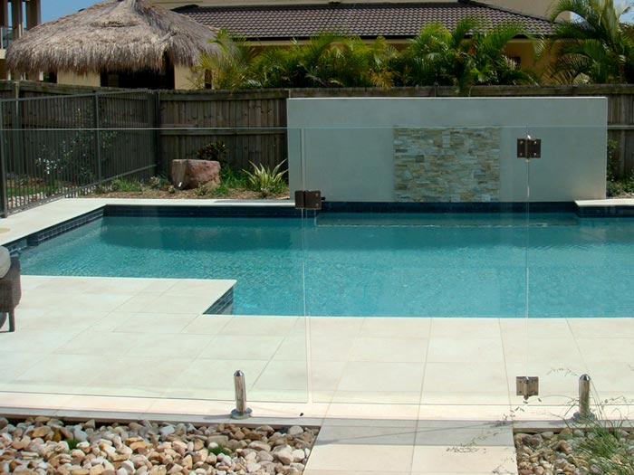 Crema Limestone stone tile or pool paver shown in situ with matching coping