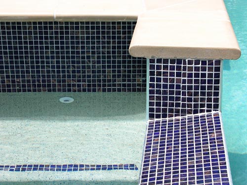 Dark Blue Gold  mosaic pool tile shown in situ