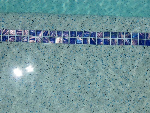 Dark Blue Gold  mosaic pool tile shown in situ