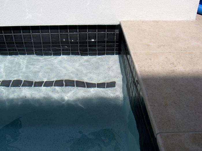 Dune Limestone stone tile or pool paver shown in situ with matching coping