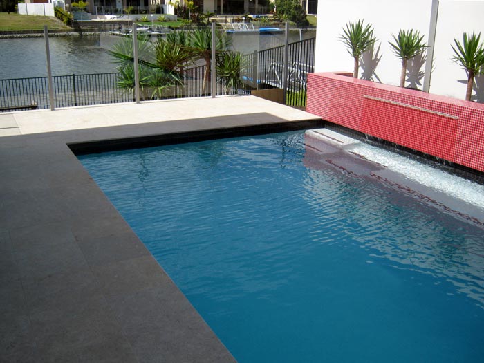 Dune Limestone stone tile or pool paver shown in situ with matching coping