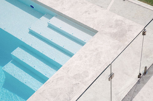 GCR305 White Crystal Pearl Blend glass mosaic pool tile shown in situ