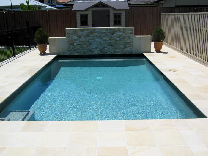 HQDrifting Sand stone tile or pool paver shown in situ with matching coping