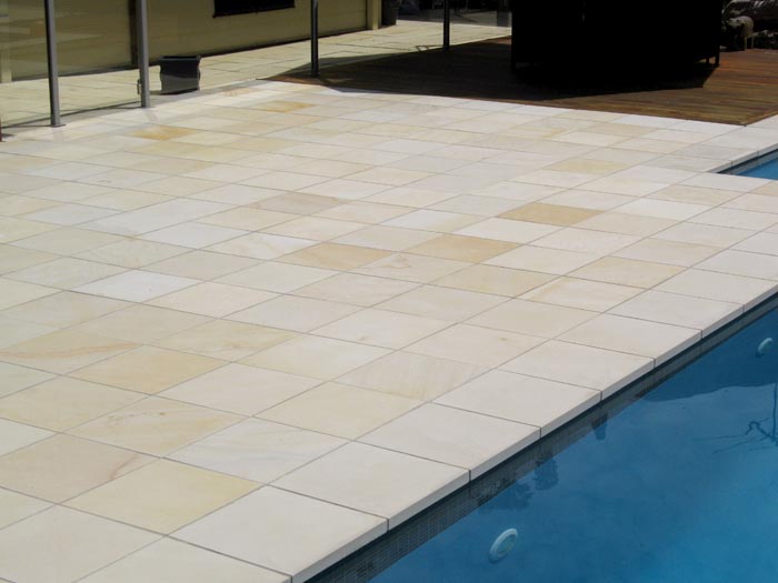 HQDrifting Sand stone tile or pool paver shown in situ with matching coping