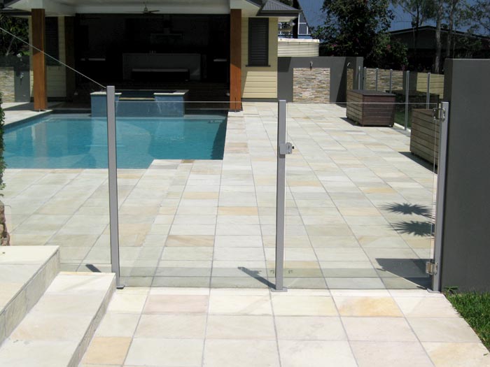 HQ Natural stone tile or pool paver shown in situ with matching coping