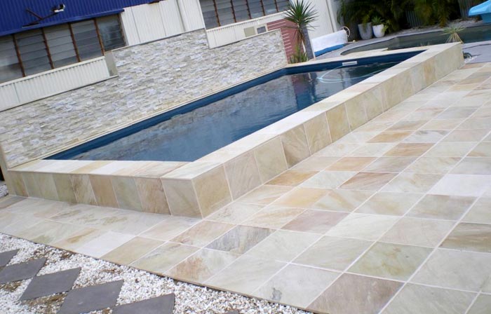 Natural Mint Himalayan Quartz stone tile or pool paver shown in situ with matching coping