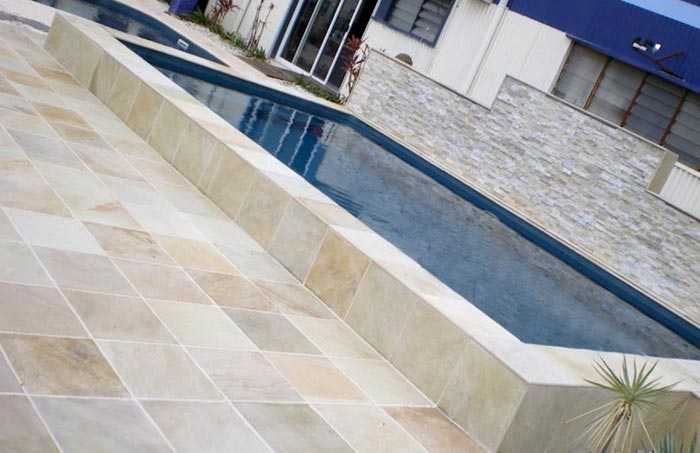 Natural Mint Himalayan Quartz stone tile or pool paver shown in situ with matching coping