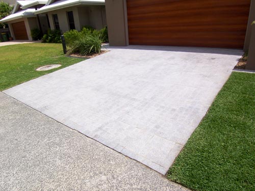 Light Grey Granite stone tile or pool paver shown in situ with matching coping