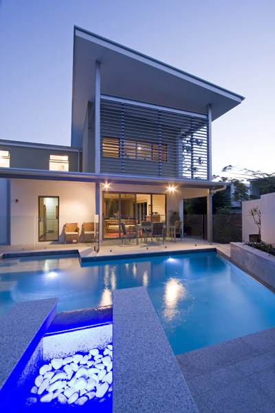 Light Grey Granite stone tile or pool paver shown in situ with matching coping