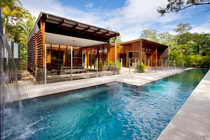 Mushroom Granite stone tile or pool paver shown in situ with matching coping