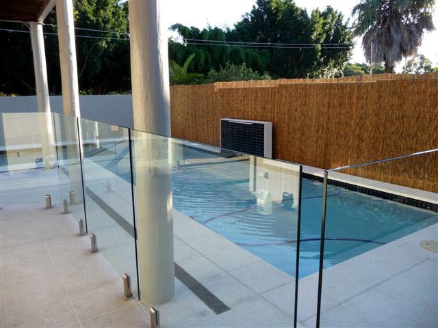 Mushroom Granite stone tile or pool paver shown in situ with matching coping