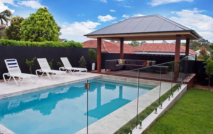 Silver Marble stone tile or pool paver shown in situ with matching coping