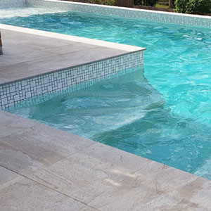 Photo Gallery of Pool Pavers and Stone Tiles and matching coping tiles