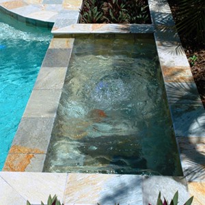 Magnificent Spa with Quartzite Coping and Tiles