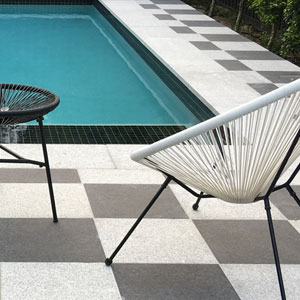 Nero Porcellano® Tiles paired with Light Grey Granite