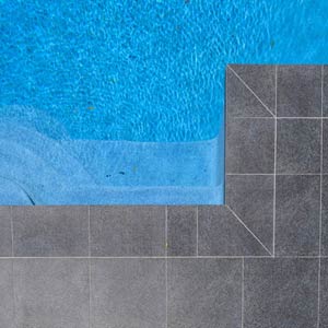 Nero Porcellano® Tiles paired with Light Grey Granite