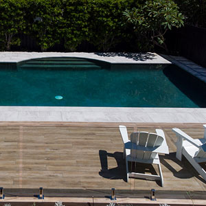 Oak TileDeck with Ash Marblano®® tiles used as pool coping and surrounds.