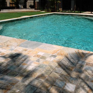 Quartzite Coping with matching Cobblestone Paving