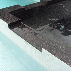 GC099 Black Caramel mosaic tiles tiled this Spa pool