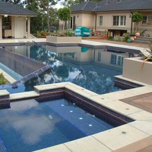 Pool and Spa tiled with GC125 Dark Blue Gold glass mosaic tiles