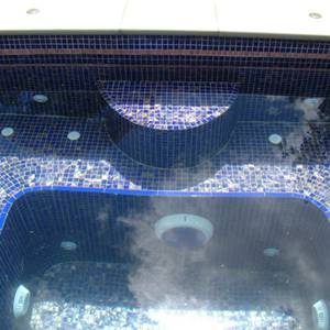  Spa interior tiled with GC125 Dark Blue Gold glass mosaic tiles