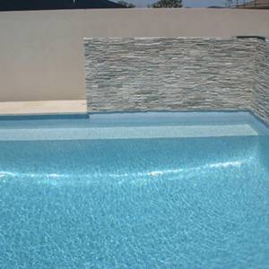 Swimming pool tiled with GC139 Ice Blue Pearl 20mm glass mosaic pool tiles