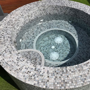 GC480 Tempest Glass mosaic tiles tiling a pools interior