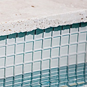 GCR150 Ivory 23mm ceramic mosaic pool tiles shown as waterline tiles