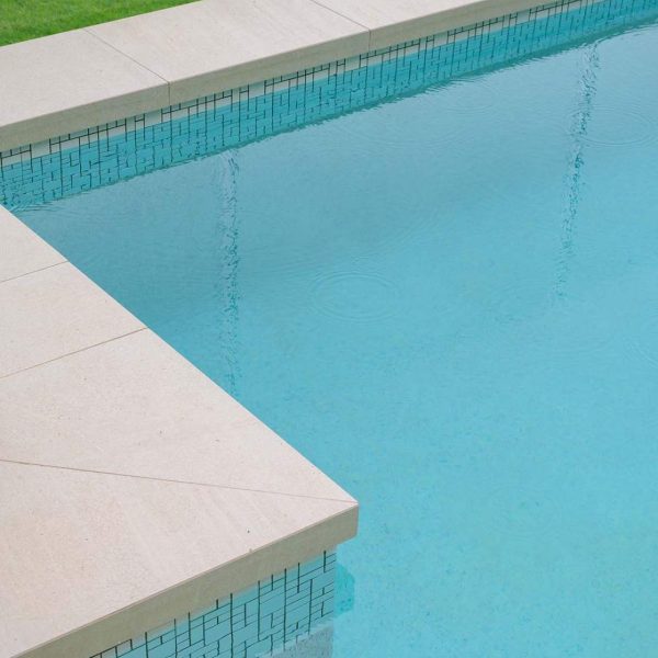 CMC473 Urban White waterline tiles with Pluto porcelain pool coping