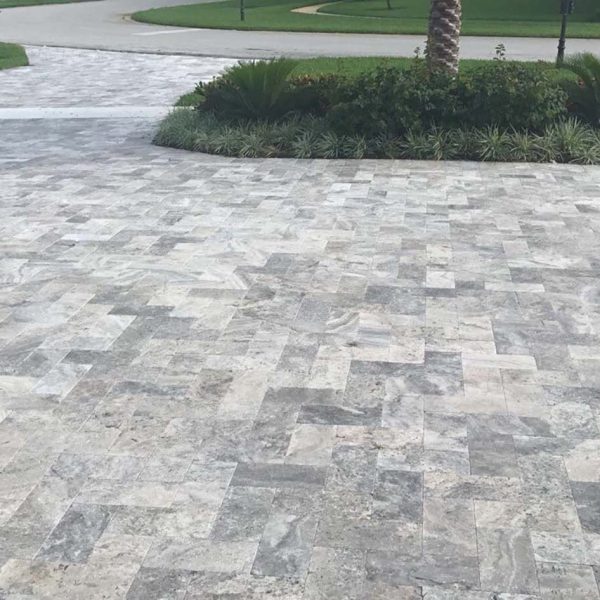 Pathway tiled with Silver Travertine Cobbles