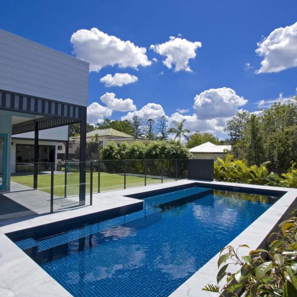 Sandwave Granite bullnose pool coping and surrounds with fully tiled pool in CMC098 Ocean Blue Ceramic