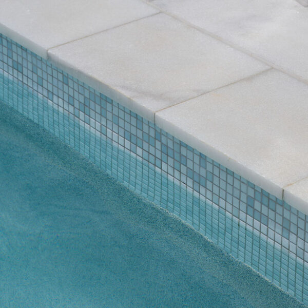 Havana White Marble square edge coping and surrounds & GC420 Alpine glass mosaic waterline and step marker