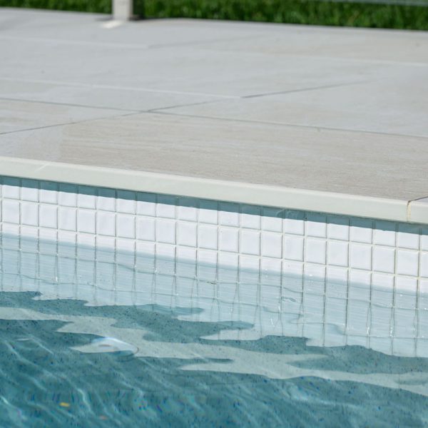 Bianco Marblano Coping and Surrounds, with CMC555 White Wavy waterline mosaic