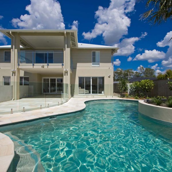 Natural Himalayan Sandstone bullnose pool coping and surrounds with Ice Blue waterline tiles