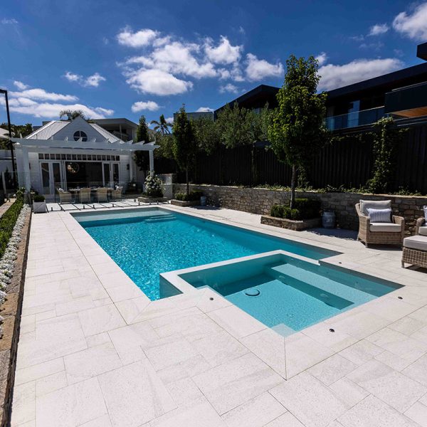 Coconut Ice GC195 fully-tiled pool with Coconut Drift Coping and french pattern surrounds (20)